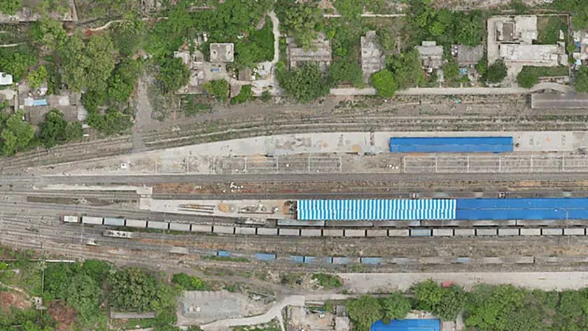 Drone orthomosaic of station tracks, platform sheds and goods wagons used for asset mapping